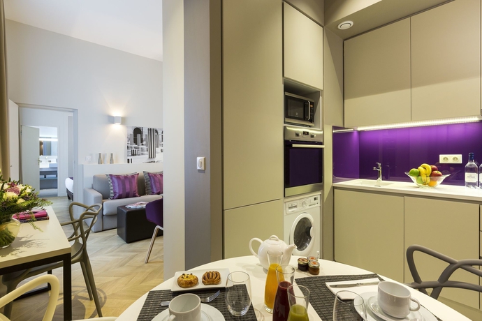 Imagen de la habitación del Hotel Citadines Opéra Paris. Foto 12