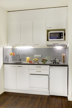 Imagen de la habitación del Hotel Citadines Sainte-catherine Brussels. Foto 7