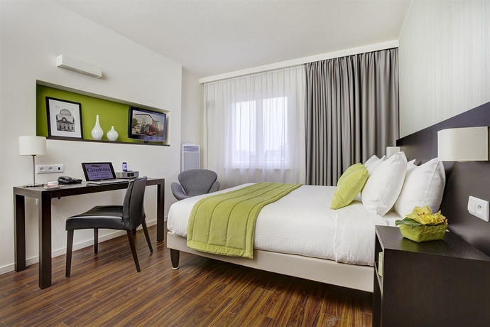 Imagen de la habitación del Hotel Citadines Sainte-catherine Brussels. Foto 12