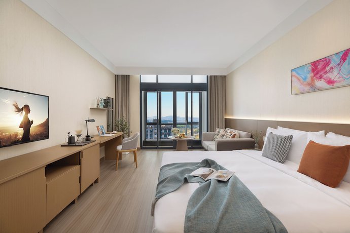 Imagen de la habitación del Hotel Citadines Science City Guangzhou. Foto 4