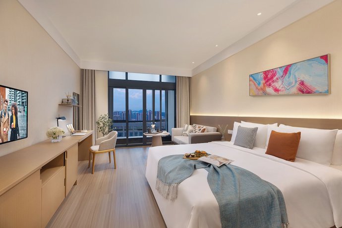 Imagen de la habitación del Hotel Citadines Science City Guangzhou. Foto 6