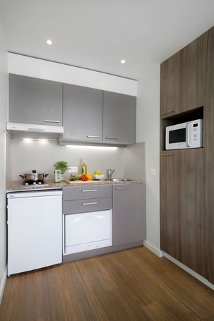 Imagen de la habitación del Hotel Citadines Toison D'or Brussels. Foto 11