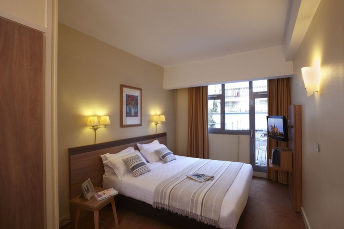 Imagen de la habitación del Hotel Citadines Trocadéro Paris. Foto 6