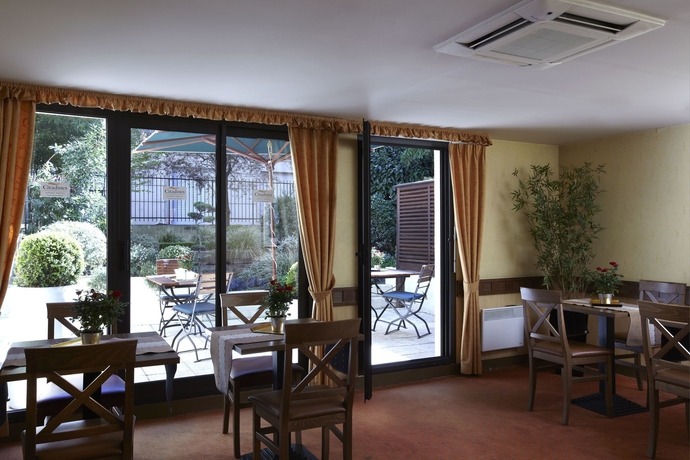 Imagen del bar/restaurante del Hotel Citadines Trocadéro Paris. Foto 3