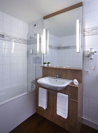 Imagen de la habitación del Hotel Citadines Trocadéro Paris. Foto 7