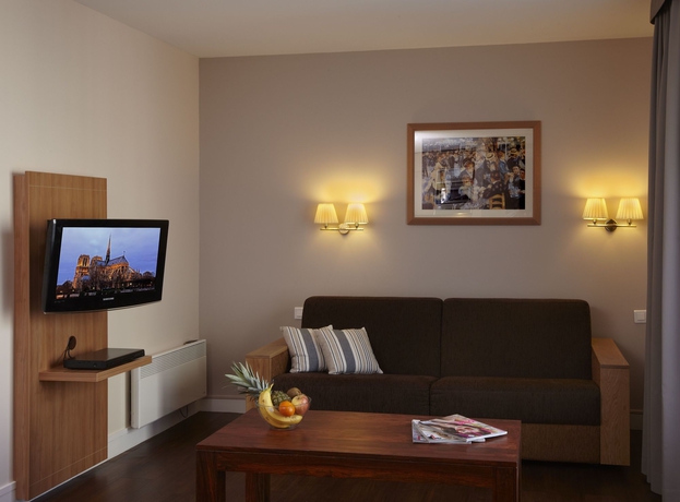 Imagen de los interiores del Hotel Citadines Trocadéro Paris. Foto 15