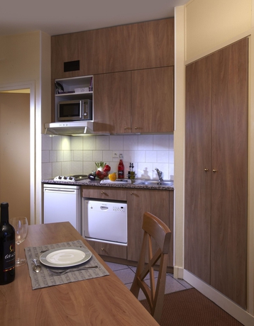 Imagen de la habitación del Hotel Citadines Trocadéro Paris. Foto 10