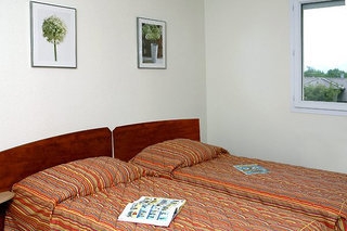 Imagen de la habitación del Hotel Citea Prevessin Moens. Foto 4