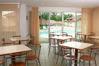 Imagen del bar/restaurante del Hotel Citea Prevessin Moens. Foto 3