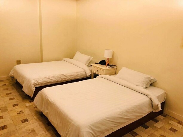 Imagen de la habitación del Hotel Citi Garden Suites. Foto 23