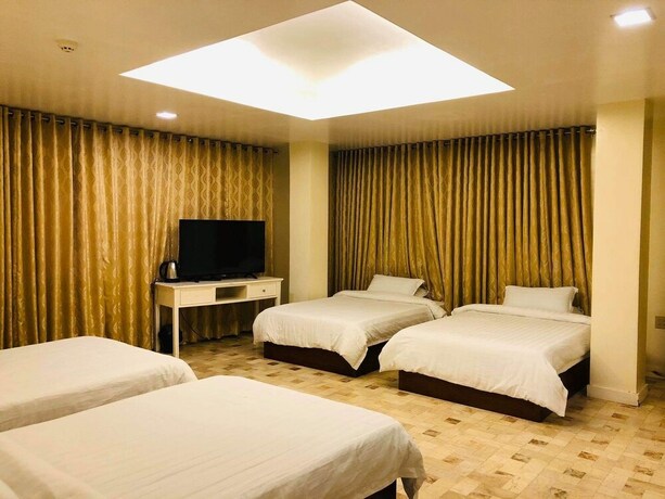 Imagen de la habitación del Hotel Citi Garden Suites. Foto 29