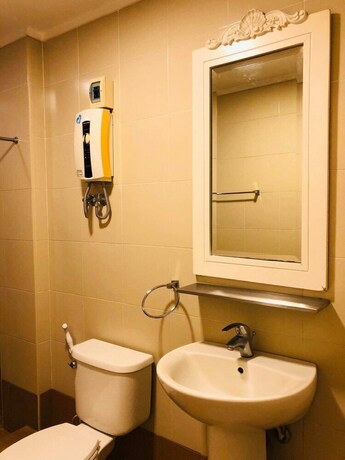 Imagen de la habitación del Hotel Citi Garden Suites. Foto 30