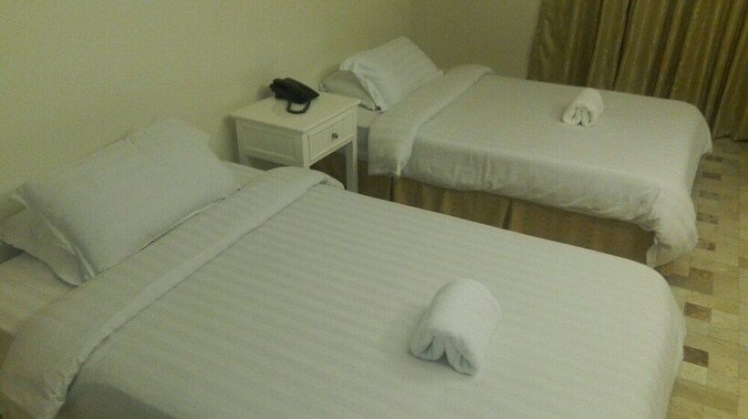 Imagen de la habitación del Hotel Citi Garden Suites. Foto 31