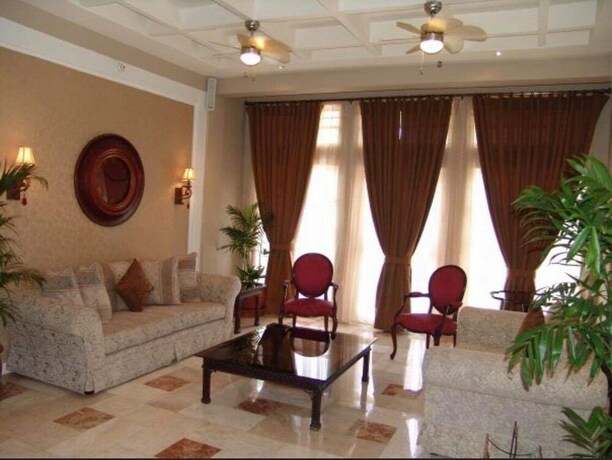 Imagen de los interiores del Hotel Citi Garden Suites. Foto 34