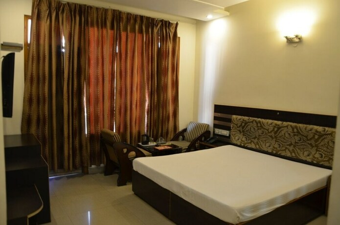 Imagen de la habitación del Hotel Citi Heights. Foto 7