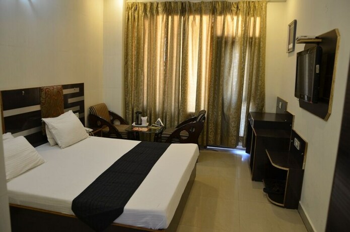 Imagen de la habitación del Hotel Citi Heights. Foto 11