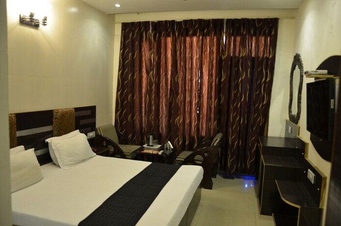 Imagen de la habitación del Hotel Citi Heights. Foto 13