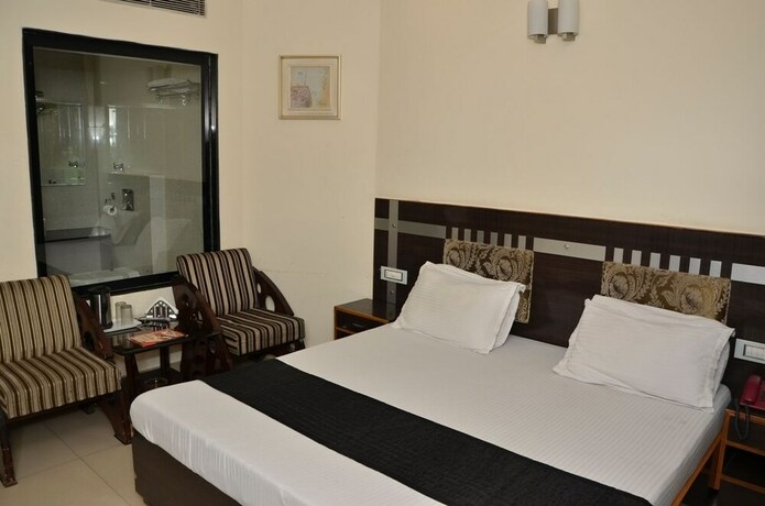 Imagen de la habitación del Hotel Citi Heights. Foto 14