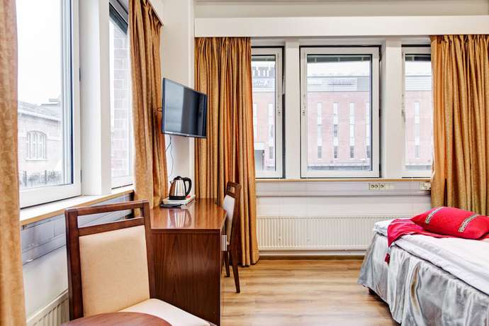 Imagen de la habitación del Hotel Citi Inn. Foto 4