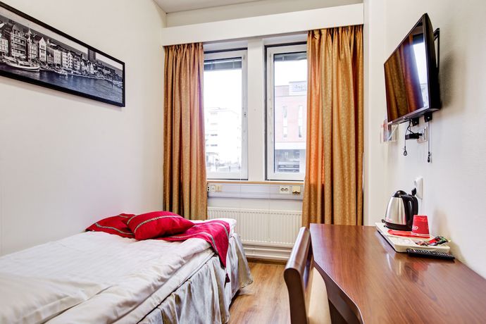 Imagen de la habitación del Hotel Citi Inn. Foto 15