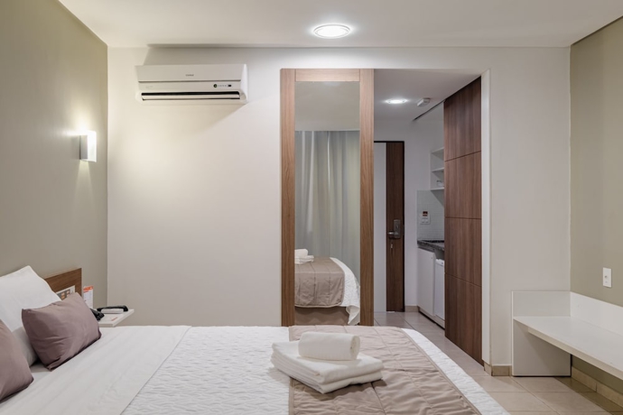 Imagen de la habitación del Hotel Citi Residence. Foto 8