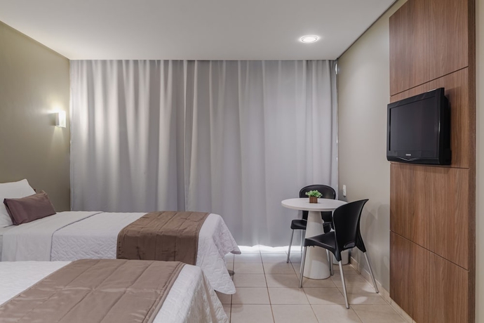 Imagen de la habitación del Hotel Citi Residence. Foto 10