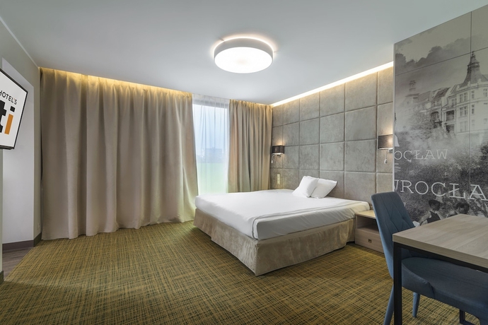 Imagen de la habitación del Hotel Citi 's Wroclaw. Foto 16