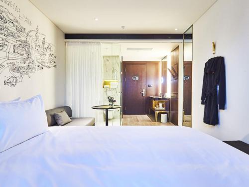 Imagen de la habitación del Hotel CitiGO Hongqiao Shanghai. Foto 4