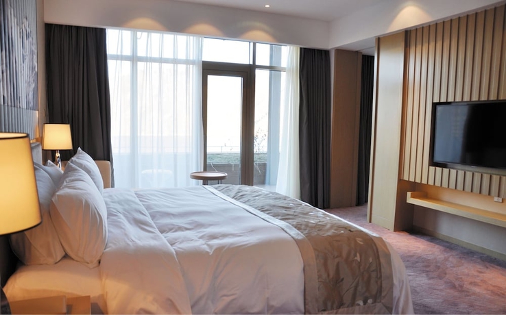 Imagen de la habitación del Hotel Citic Jinling. Foto 12