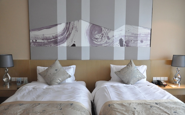 Imagen de la habitación del Hotel Citic Jinling. Foto 14