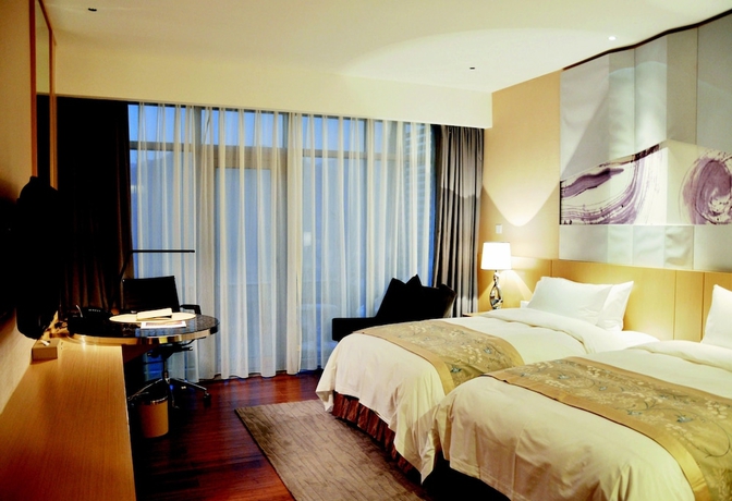 Imagen de la habitación del Hotel Citic Jinling. Foto 15