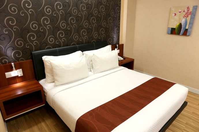 Imagen de la habitación del Hotel Citihub @gejayan, Yogyakarta. Foto 11