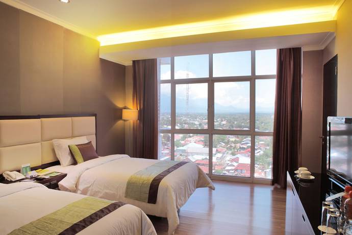 Imagen de la habitación del Hotel Citimall Gorontalo. Foto 7