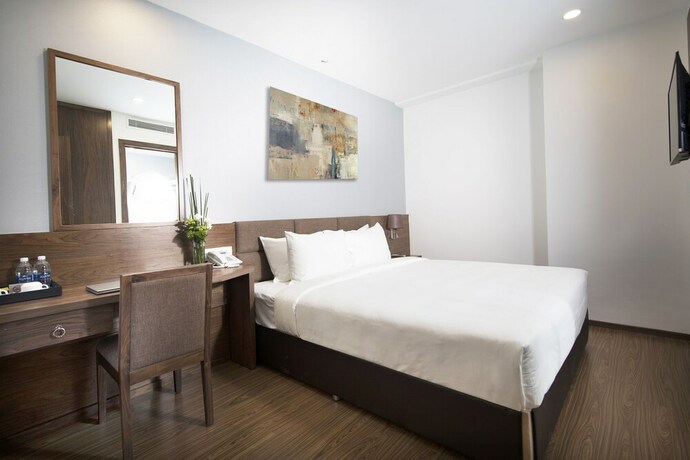 Imagen de la habitación del Hotel Cititel Parkview Saigon. Foto 7