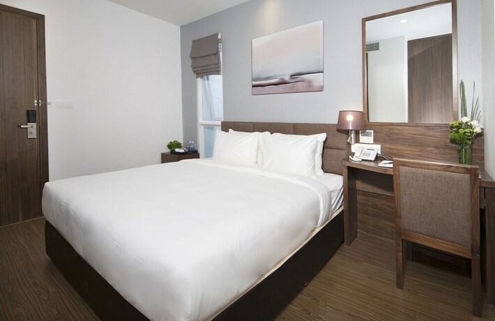 Imagen de la habitación del Hotel Cititel Parkview Saigon. Foto 8