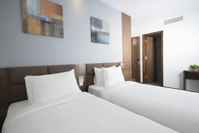 Imagen de la habitación del Hotel Cititel Parkview Saigon. Foto 10