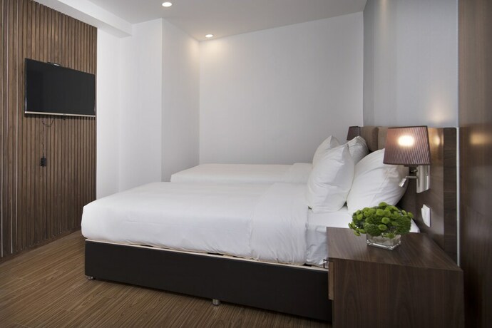 Imagen de la habitación del Hotel Cititel Parkview Saigon. Foto 14