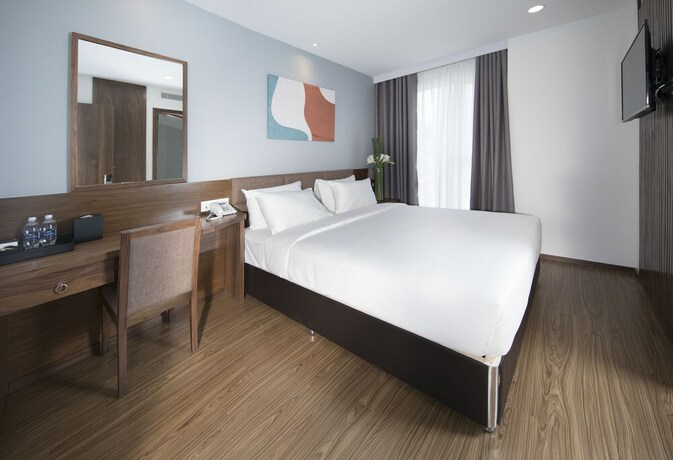 Imagen de la habitación del Hotel Cititel Parkview Saigon. Foto 15