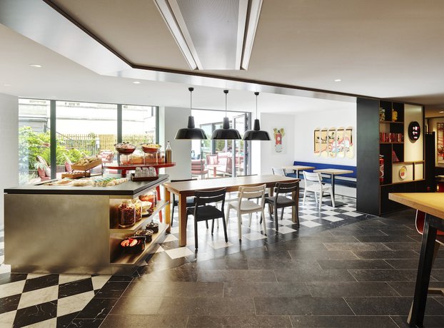 Imagen del bar/restaurante del Hotel Citizenm Paris Champs-Élysées. Foto 5