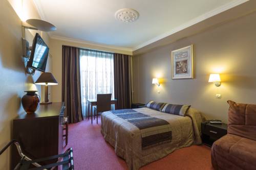 Imagen de la habitación del Hotel Cit&ocirc;tel Le Plat D'etain. Foto 11