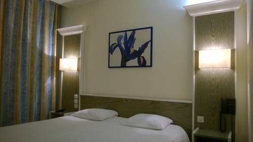 Imagen de la habitación del Hotel Citotel Dav'hotel Jaude. Foto 10