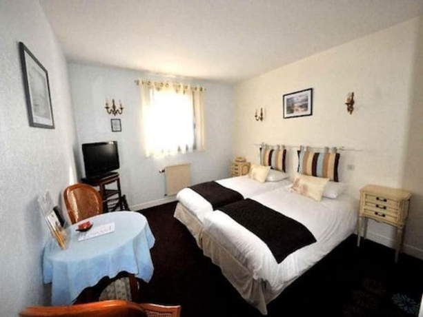 Imagen de la habitación del Hotel Citotel La Chaumiere Roz Aven. Foto 16