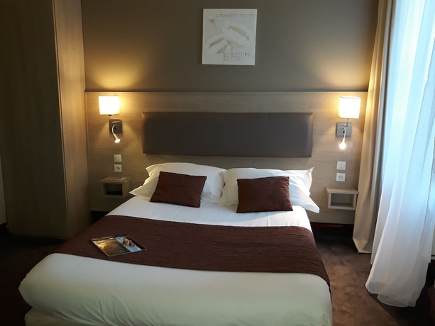 Imagen de la habitación del Hotel Citotel Le Challonge. Foto 14