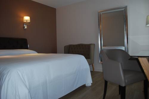 Imagen de la habitación del Hotel Citotel Le Chene Vert. Foto 7