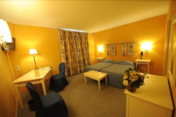 Imagen de la habitación del Hotel Citotel Le Relais Du Bellay. Foto 12