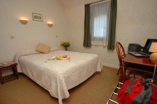 Imagen de la habitación del Hotel Citotel Le Volney. Foto 12