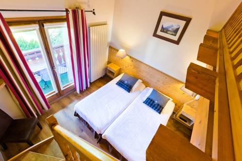 Imagen de la habitación del Hotel Citotel Les Pres Du Rosay. Foto 4