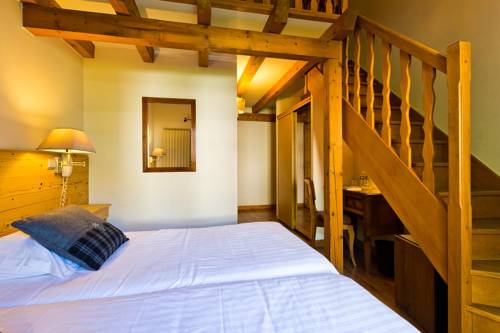 Imagen de la habitación del Hotel Citotel Les Pres Du Rosay. Foto 6