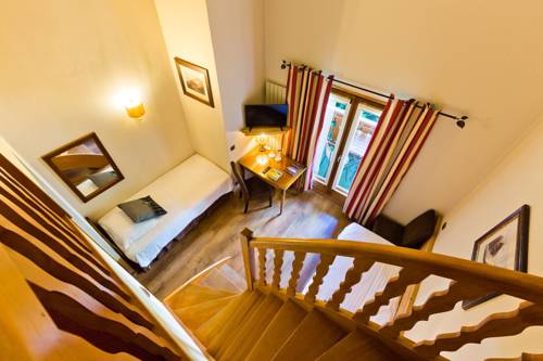 Imagen de la habitación del Hotel Citotel Les Pres Du Rosay. Foto 8