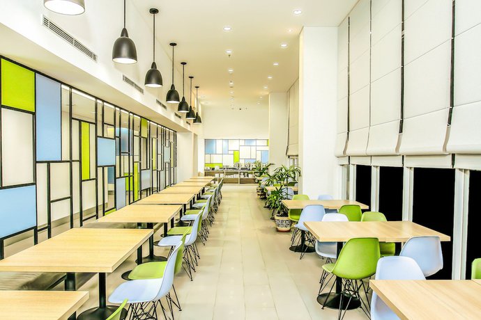 Imagen del bar/restaurante del Hotel Citradream Cirebon. Foto 4